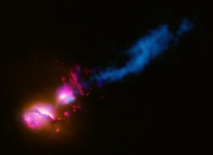 The jet from the black hole in 3C321 striking the edge of another galaxy. Credit: NASA/CXC/STScI/NSF/VLA/CfA/D.Evans et al/STFC/JBO/MERLIN